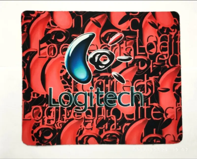 MOUSE PAD "IMPORTED" { LOGITECH }